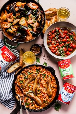tomato Bruschetta, sausage Cassoulet and Cioppino with shrimp and muscles