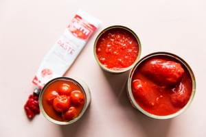 open cans of tomatoes