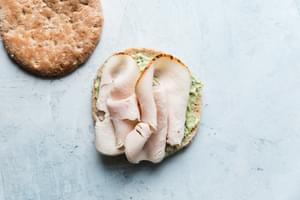 open face sandwich with turkey and pesto mayonnaise