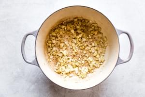 garlic and onion sautéed in a soup pot