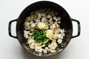 onion, ginger, garlic, jalapeño in a soup pot for Peanut soup recipe