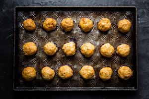freshly baked chicken meatballs on a baking sheet