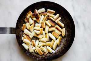 cauliflower gnocchi in a salute pan with butter