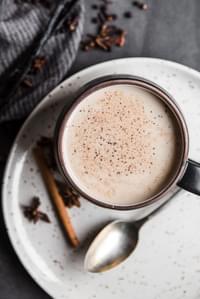 Mug on a plate with homemade chai tea