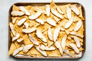 sheet pan topped with corn chips and grilled shawarma chicken