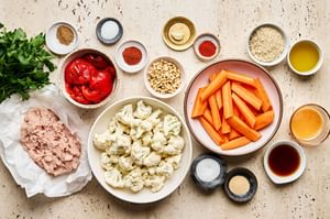 ingredients laid out to make Chicken Meatball Sheet Pan with veggies and romesco sauce