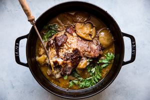 Pork shoulder roast in a large pot shallots, with fennel, Garlic, apple cider, Apple cider vinegar, Chicken stock and Apples