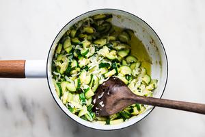 zucchini, cream, salt, parmesan, pepper, basil and garlic in a pot for creamy pasta sauce