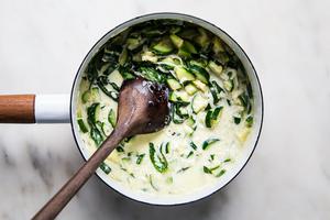 zucchini, cream, salt, parmesan, pepper, basil and garlic in a pot for creamy pasta sauce