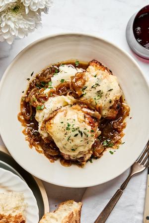 french onion chicken topped with Gruyère cheese served on top of classic mashed potatoes
