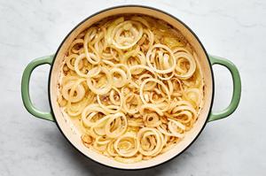 onions cooking in olive oil in a skillet