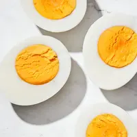 hard-boiled eggs sliced in half