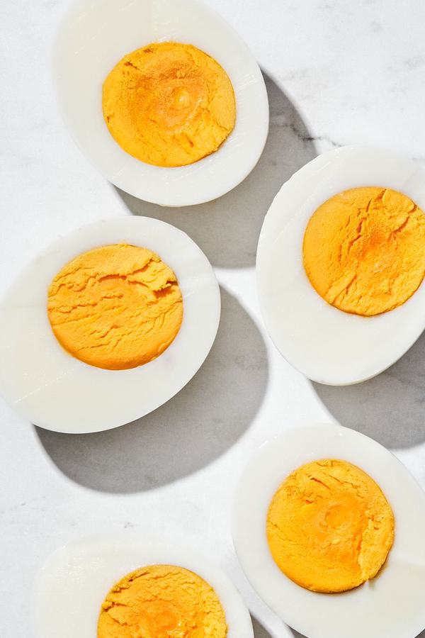 hard-boiled eggs sliced in half