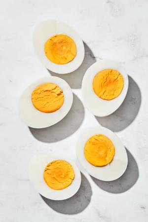 hard boiled eggs sliced in half
