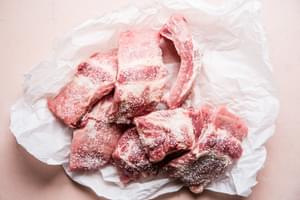 4 lbs pork ribs salted on parchment paper