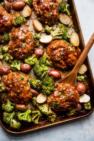 Italian-Style Meatloaf sheetpan shown with a wooden spatula