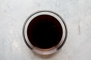 soy sauce, oyster sauce, rice vinegar, brown sugar, chili sauce, toasted sesame oil mixed in a small bowl
