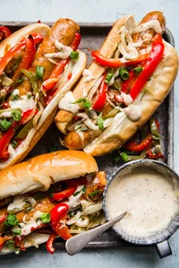 Sheet pan Italian sausage héros with honey mustard