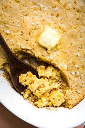 fresh baked corn spoon bread in a casserole dish