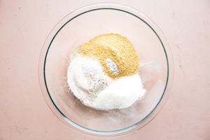 flour, sugar, cornmeal, salt and baking soda in a glass bowl
