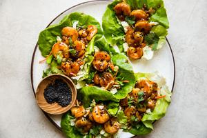 honey garlic shrimp lettuce cups with sticky sweet marinated shrimp Asian cabbage slaw in butter lettuce