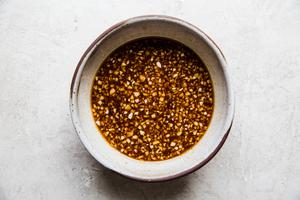 soy sauce, Sesame oil, Chili sauce, Brown sugar, honey, minced Garlic, minced ginger mixed in a little bowl for a marinade