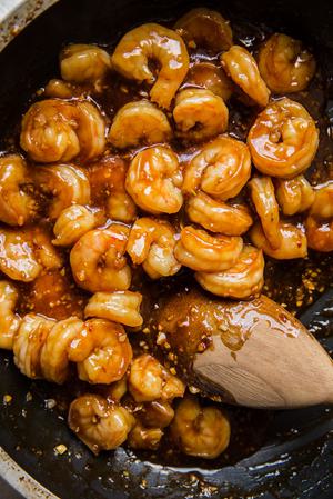 honey garlic shrimp sautéed in a pan for homemade shrimp lettuce cups
