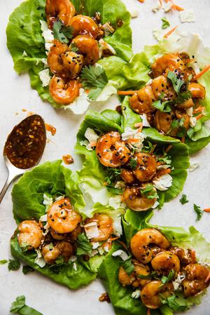 honey garlic shrimp lettuce cups with sticky sweet marinated shrimp Asian cabbage slaw in butter lettuce