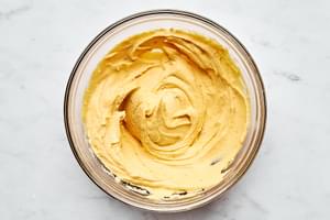 cooked egg yolk, mayo, dijon mustard, pickle juice, salt and pepper mixed in a bowl until smooth