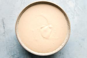 easy tahini sauce in a ceramic bowl