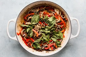 thai basil beef topped with fresh basil