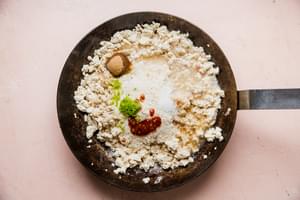 tofu, chili paste, brown sugar and lime zest shown in a large skillet