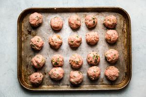 Thai turkey meatballs on a baking sheet