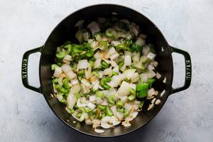 chopped onions, celery and garlic cooking in olive oil in a large pot