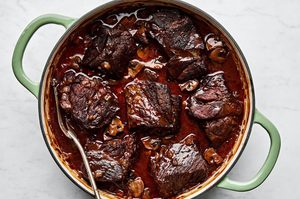 Wine Braised Beef with Mushrooms in a large pot, the perfect cozy, hearty dinner for cold weather
