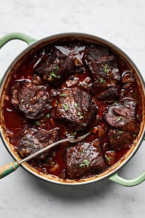Wine Braised Beef with Mushrooms in a large pot, the perfect cozy, hearty dinner for cold weather