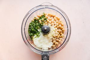 chickpeas, grated onion, cilantro, parsley and garlic in a food processor