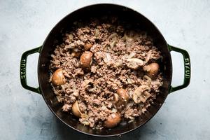 ground beef, ground pork, sliced mushrooms, diced onions and minced garlic cooking together in a pot