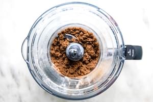 flour, brown sugar, sugar, cinnamon, salt and butter mixed together in a processor for apple crumb cake topping