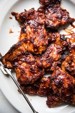 Baked BBQ Chicken Thighs on a white platter