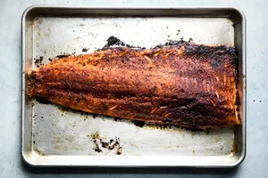 baked salmon a sheet pan seasoned with brown sugar, salt, paprika, garlic powder and pepper