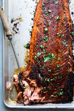 baked salmon a sheet pan seasoned with brown sugar, salt, paprika, garlic powder and pepper