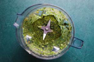 cilantro, garlic, olive oil, orange zest, orange juice, honey, salt, blackened seasoning and fresh ginger in food processor