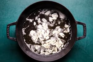 olive oil and garlic in a skillet