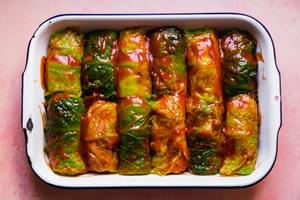 Polish cabbage rolls stuffed with seasoned ground beef, sausage & rice and brushed with ketchup on top