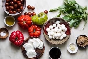 balsamic vinegar, brown sugar, garlic, olive oil, mozzarella, tomatoes, basil, salt & pepper in prep bowls