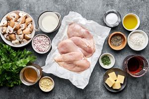 chicken, spices, flour, butter, olive oil, shallot, mushrooms, stock, wine, cream and parsley in prep bowls