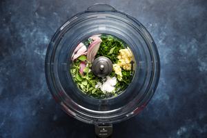 ingredients for chimichirri sauce in a food processor.