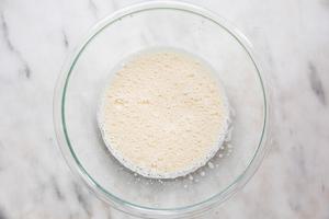 eggs and sugar blended in a glass bowl
