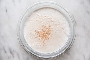 eggs, milk, cream, bourbon, rum and nutmeg blended in a glass bowl